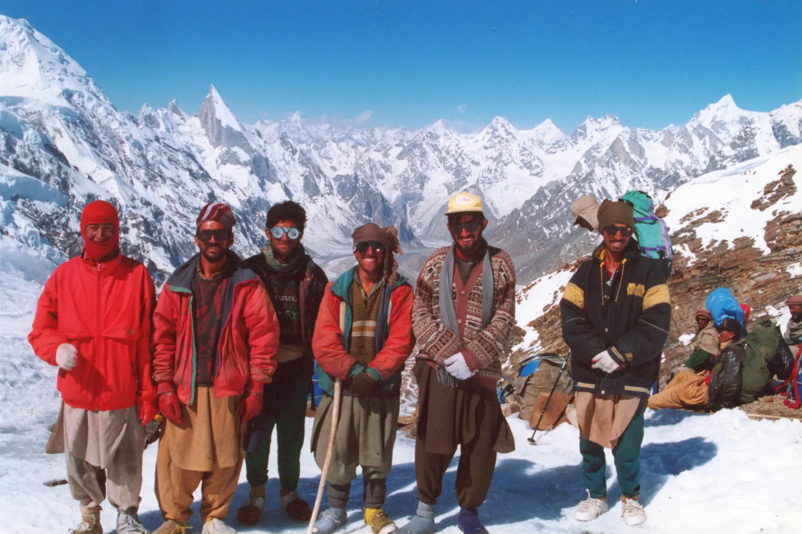 Porters and climbers on the top of Gondogoro La