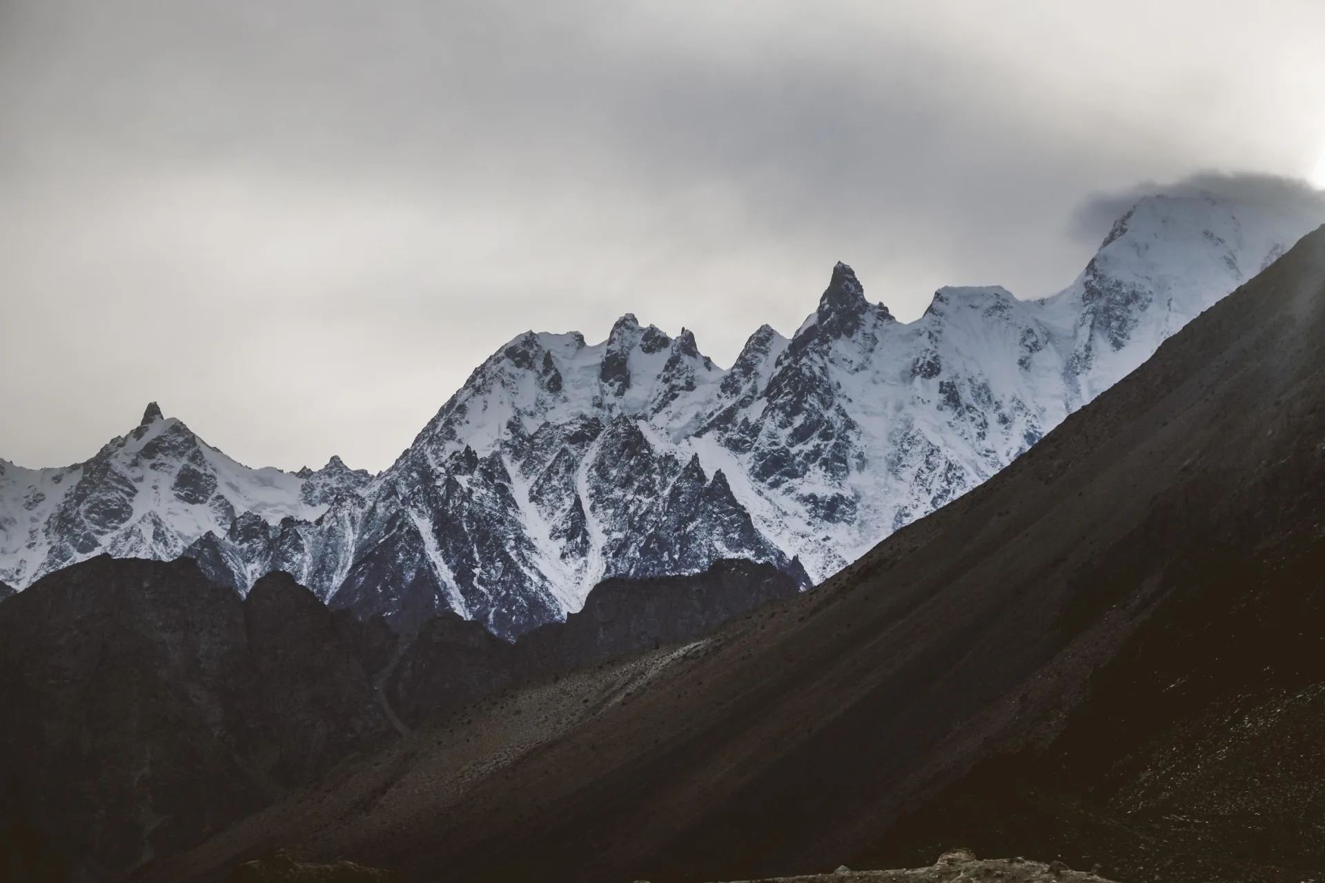 Dramatic Karakoram spires shrouded in clouds near K2