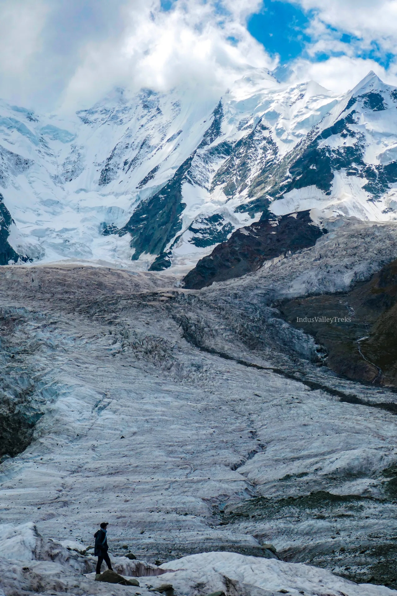 Trekker on the Minapin Glacier trail to Rakaposhi Base Camp in Hunza-Nagar