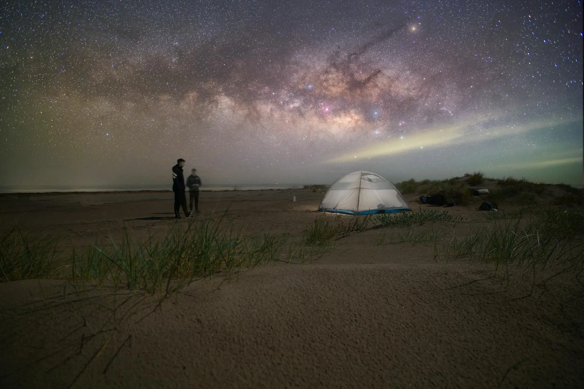 Stargazing under Milky Way at campsite