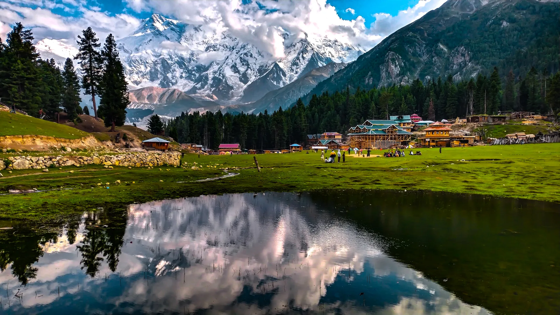 Fairy Meadows village and reflection pond below the Raikot face of Nanga Parbat, Gilgit-Baltistan