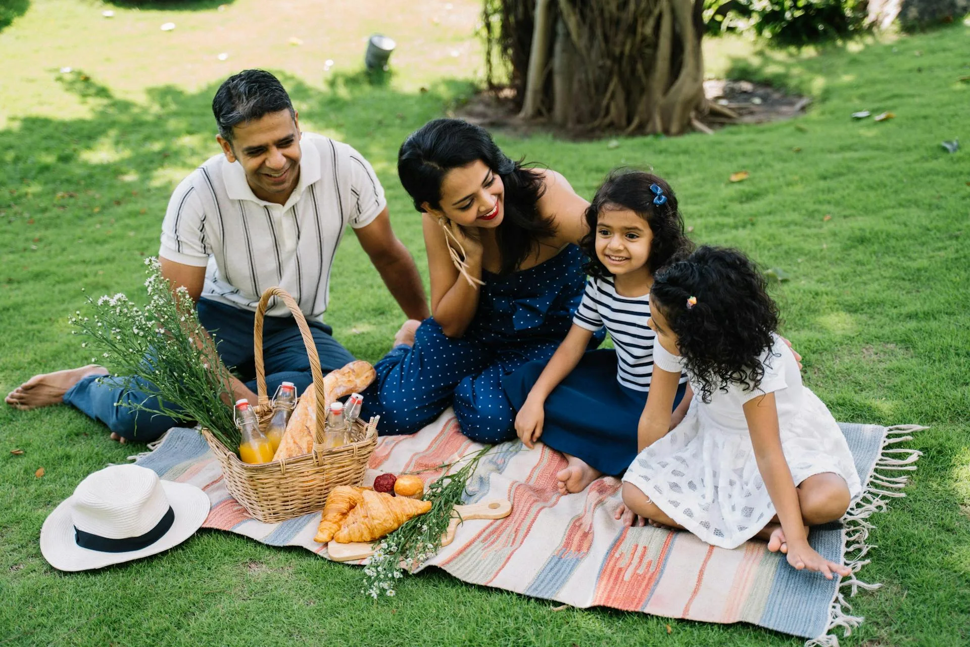 Family having joyful picnic outdoors
