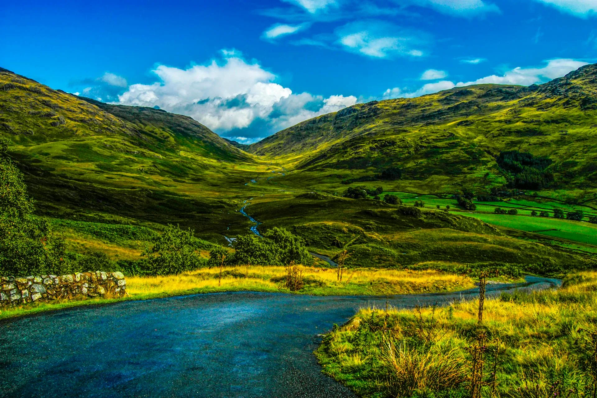Mountains with river flowing through valley