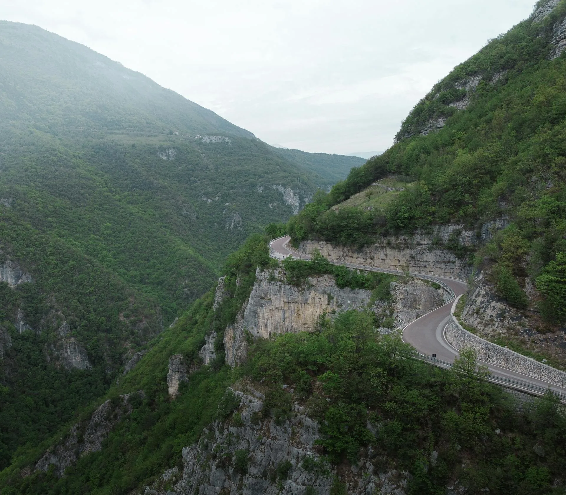 Winding road carved into mountainside