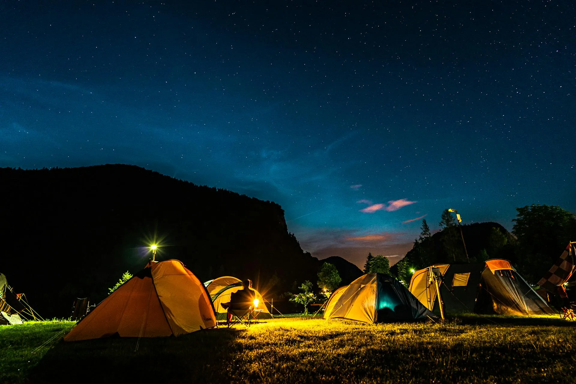 Camping in the great outdoors beneath the mountains