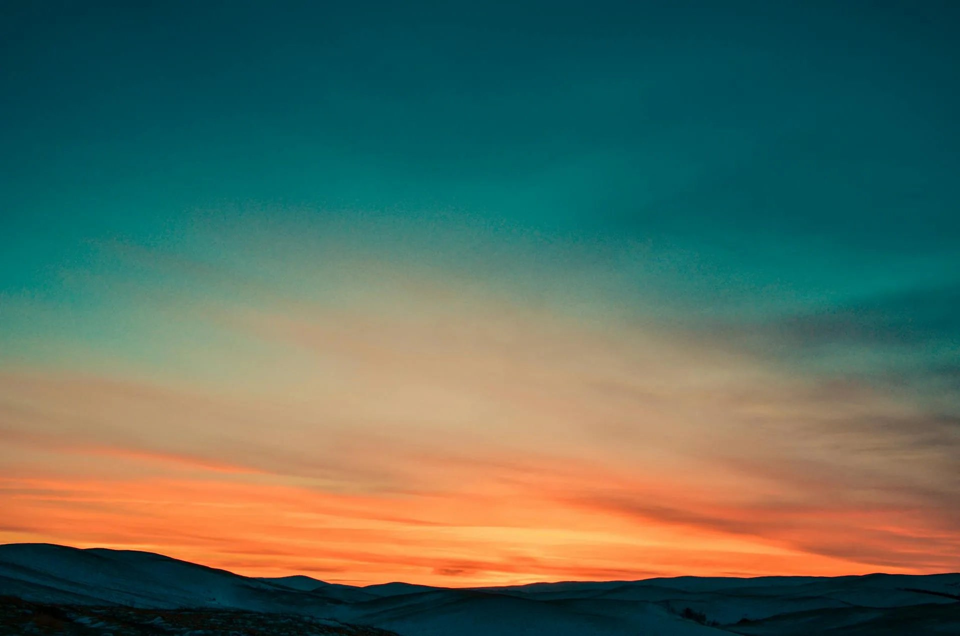 Sunset over snow-covered mountains on the Nanga Parbat circuit