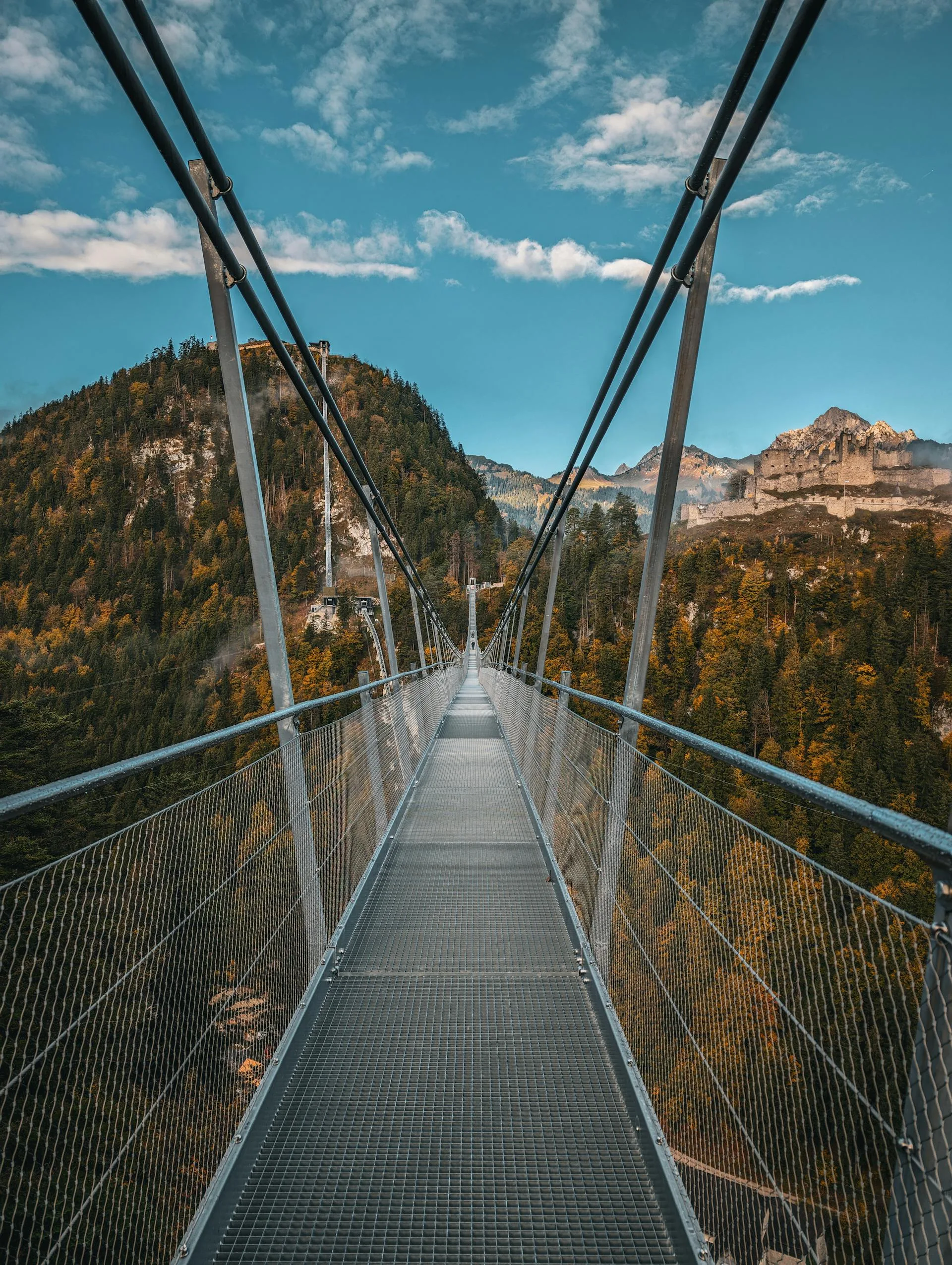 A bridge crossing a deep mountain valley