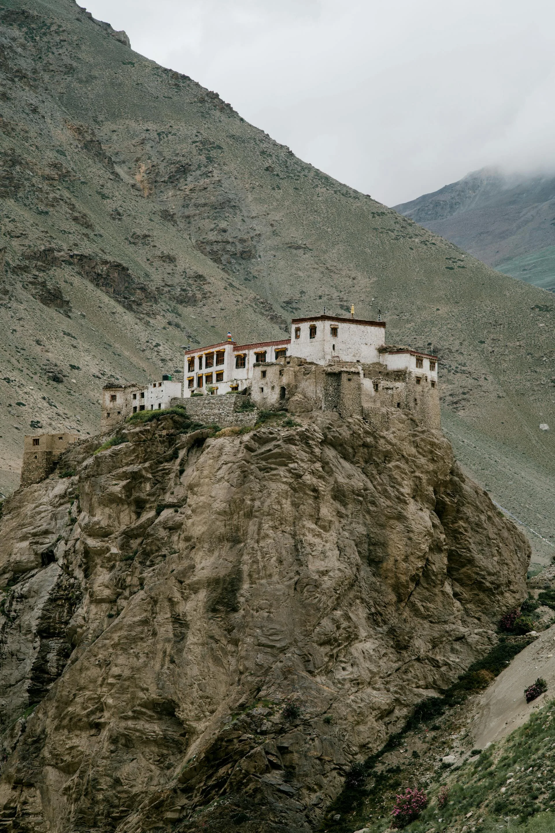 Ancient Buddhist monastery on mountain peak